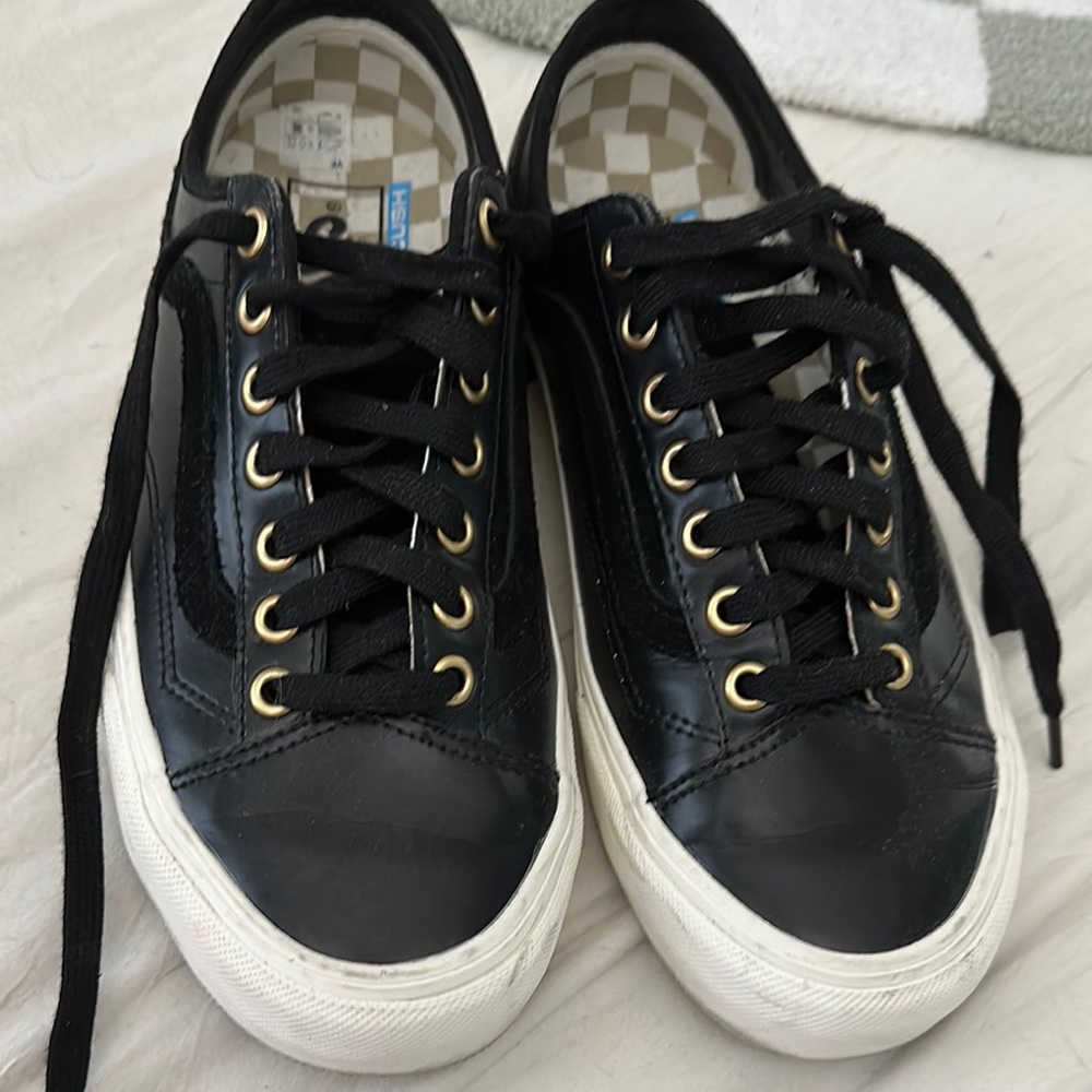 Vans Black Sneakers with Gold Accents